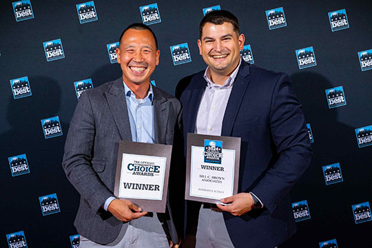 Eugene Kim and Josh James, 2 of Bill C. Brown Associates advisors accepted the award for Best of B-Town Awards at the recent awards ceremony.